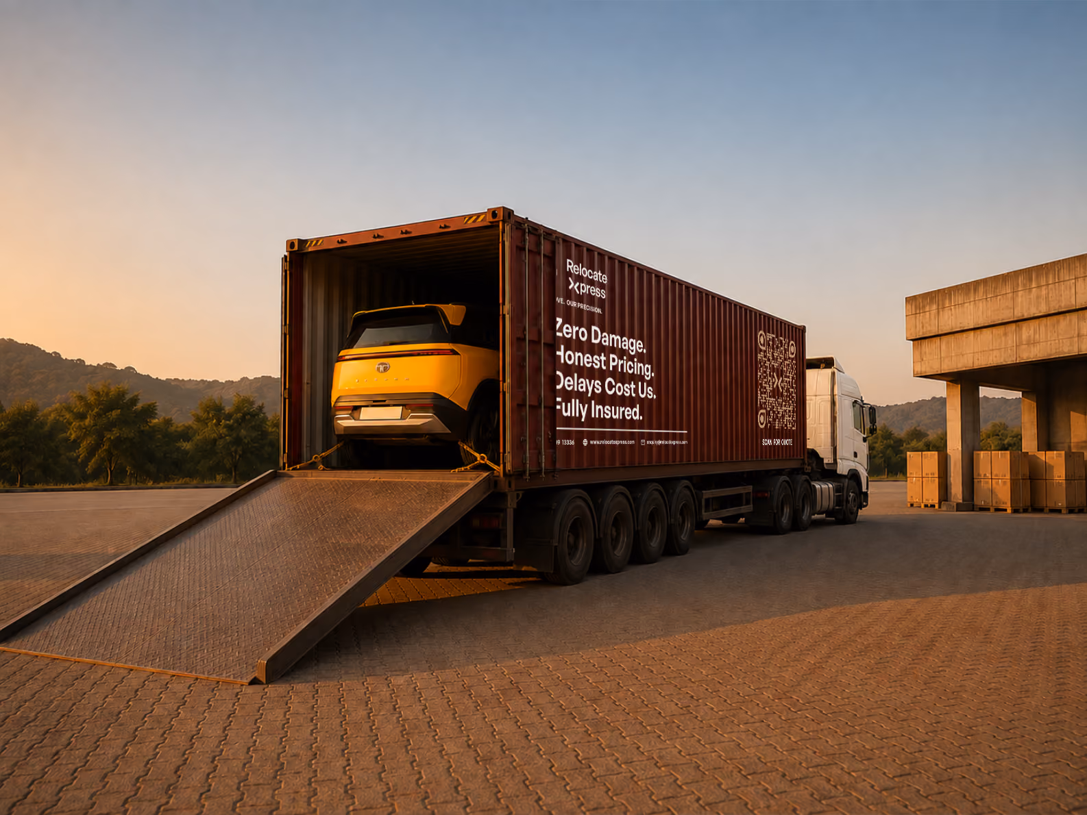 Yellow car being loaded onto transport truck at logistics terminal