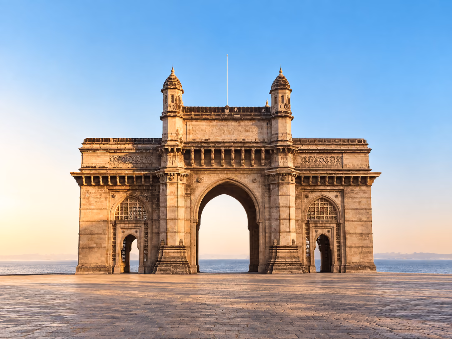 Gateway of India iconic arch monument in Mumbai at dawn with Arabian Sea