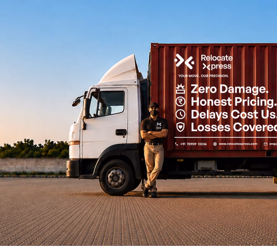 Driver posing next to moving truck with branded cargo container